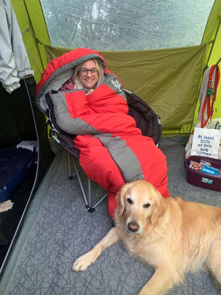 Woman wrapped in a sleeping bag