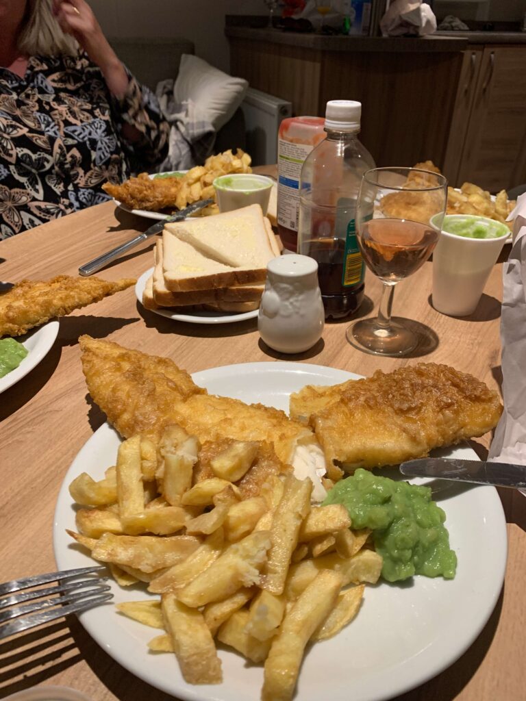Fish, chips, mushy peas and bread and butter