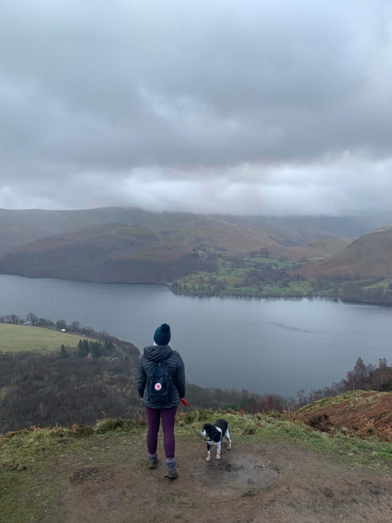 Woman and her dog overlooking Ullswater