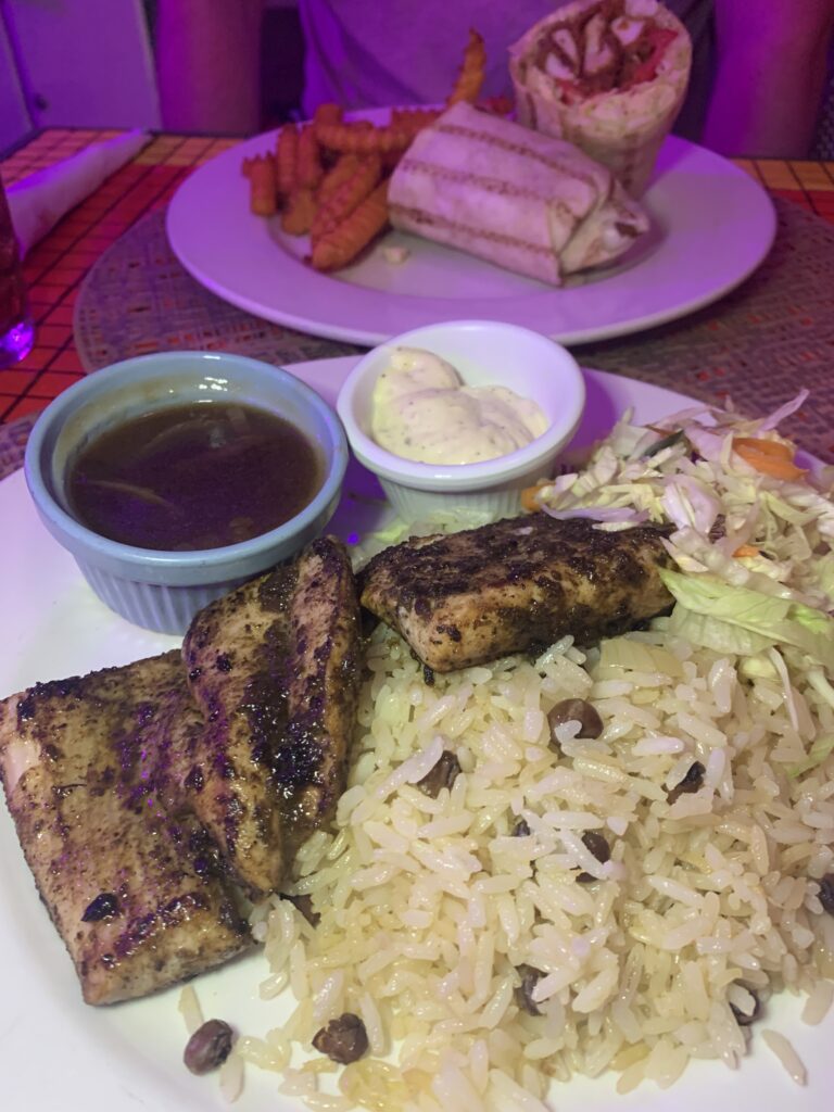Mahi mahi with rice and peas, gravy and sour cream