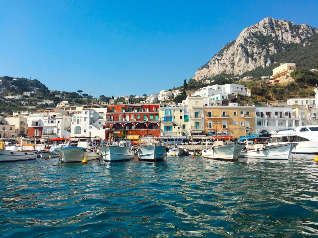 Row of buildings with boats in front of them in Capri