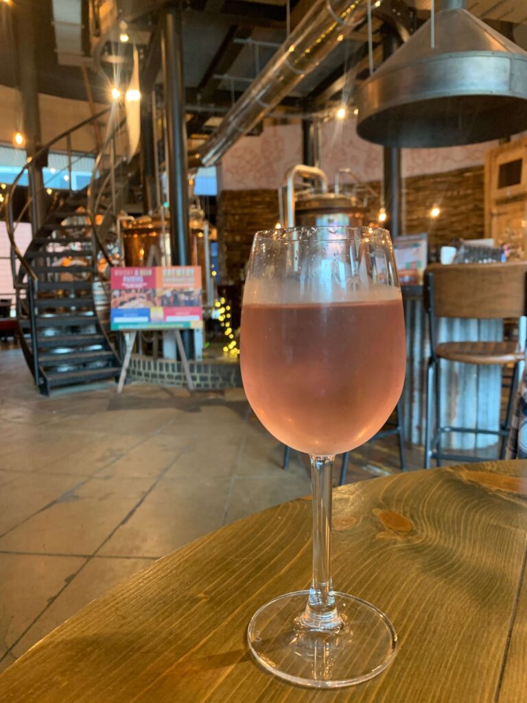 Glass of pale rose wine at Brewhouse & Kitchen in Milton Keynes