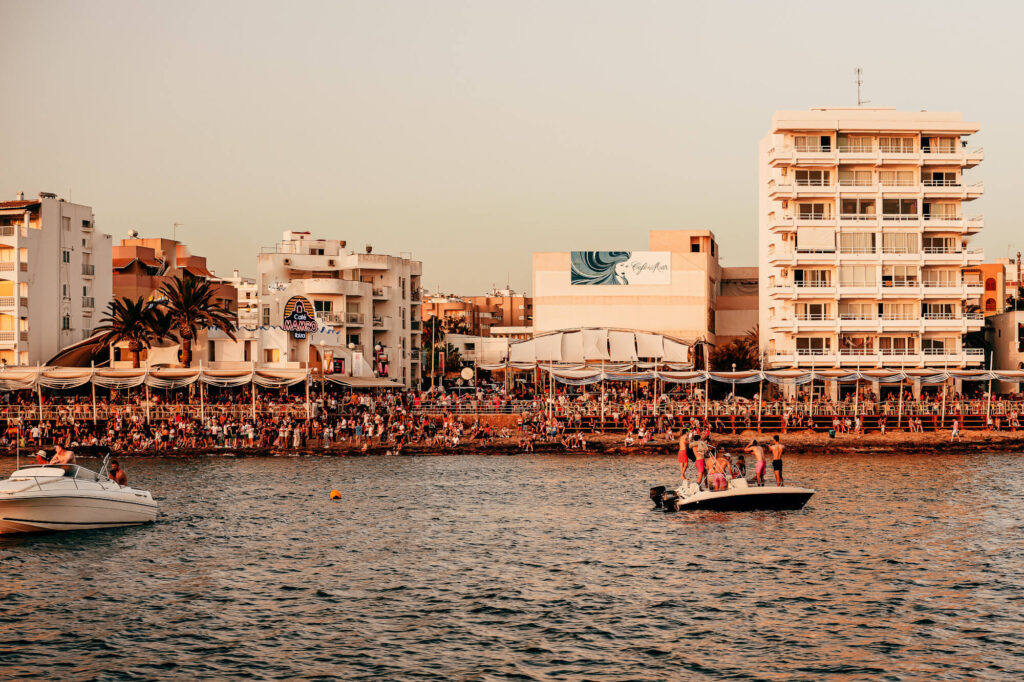 Groups of people watching the sunset at Cafe Mambo in Ibiza