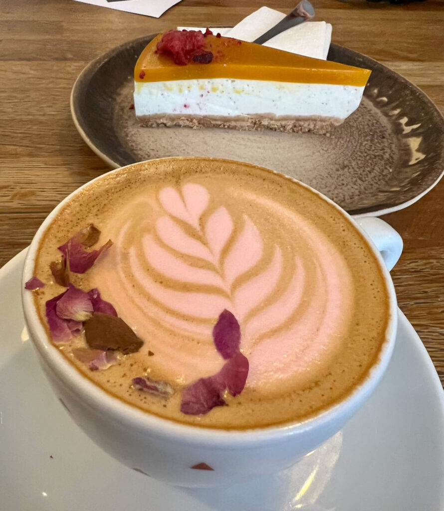 A slice of cheesecake and a rose latte at Cafe Datel in Ceske Budejovice.