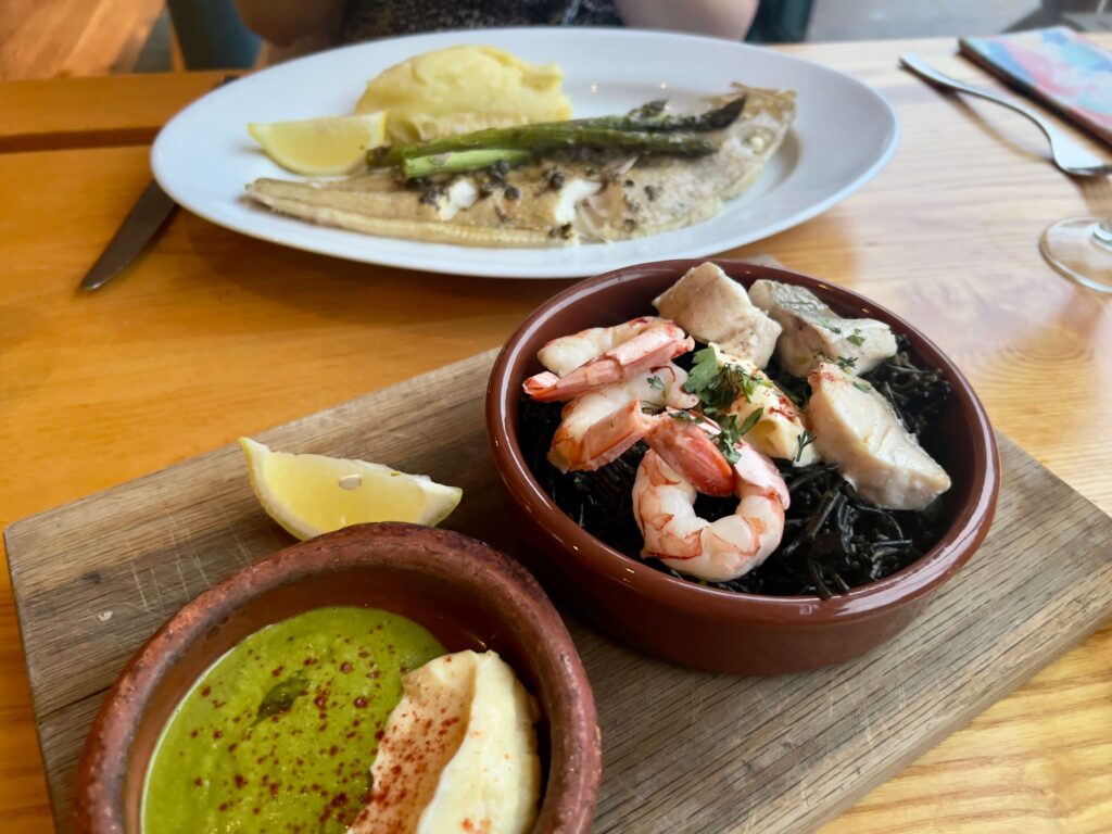 The seafood fideua and the lemon sole main courses at the Thames Lido restaurant.