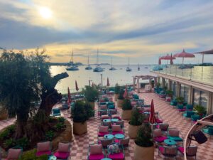 A view over the outdoor area at Hotel NYX Ibiza out over San Antonio Bay