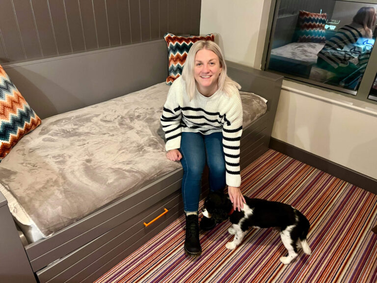 Sam and Alfie relaxing in the room at Bike & Boot.