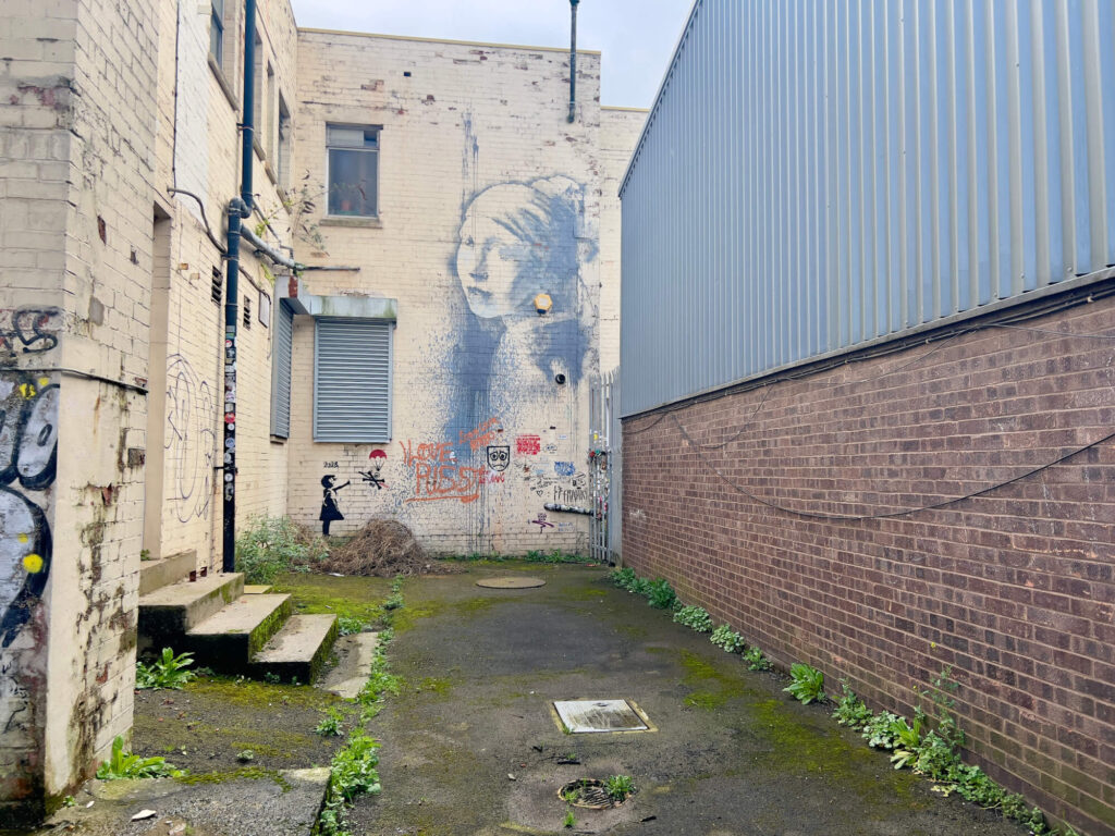 The Girl with the Pierced Eardrum, a Banksy artwork in Bristol.