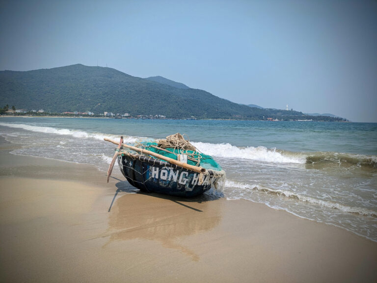 Boat on the shore on Da Nang beach.