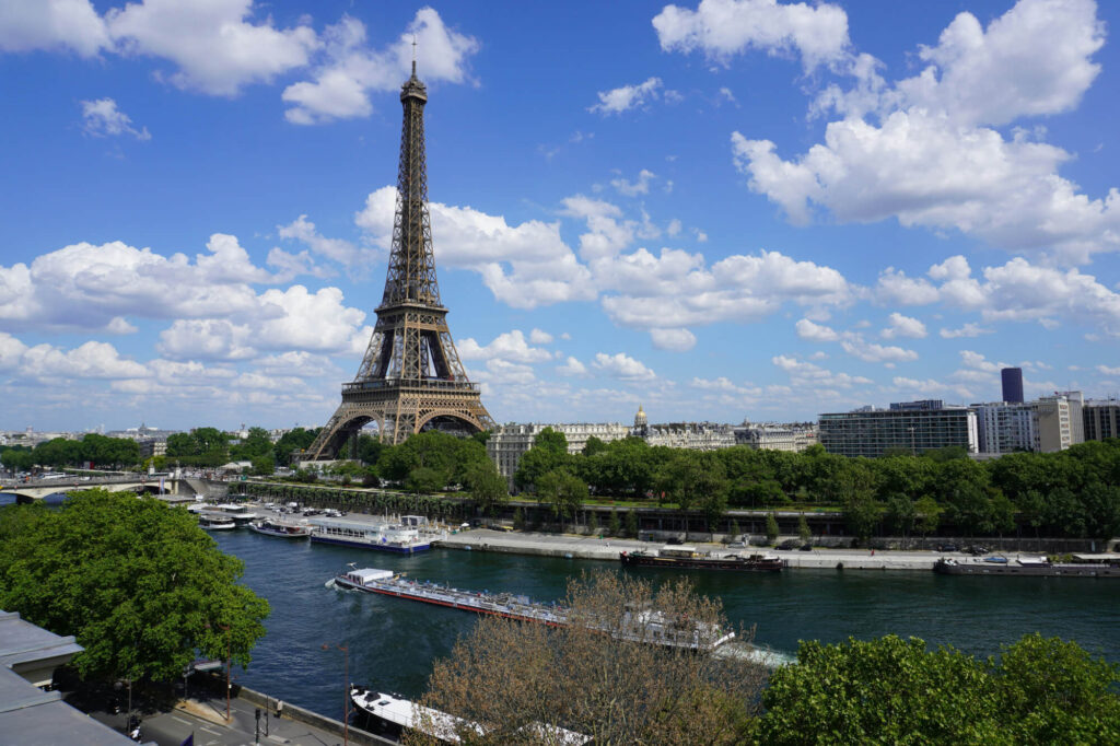 The River Seine in Paris with the Eiffel Tower behind it.