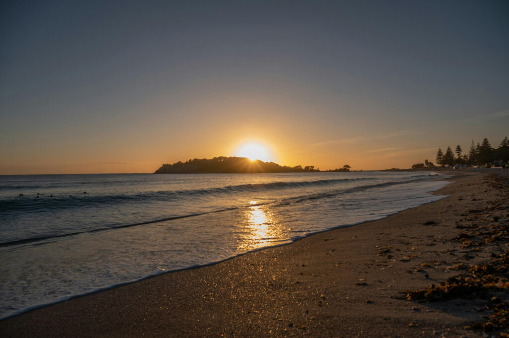 Sunrise on a beach in New Zealand.