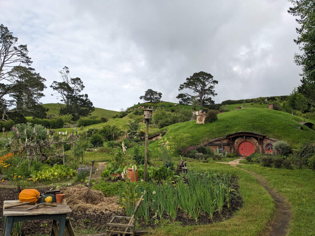 A hobbit house with a red door in Hobbiton.