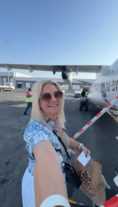 Sam boarding an Air Cairo flight.