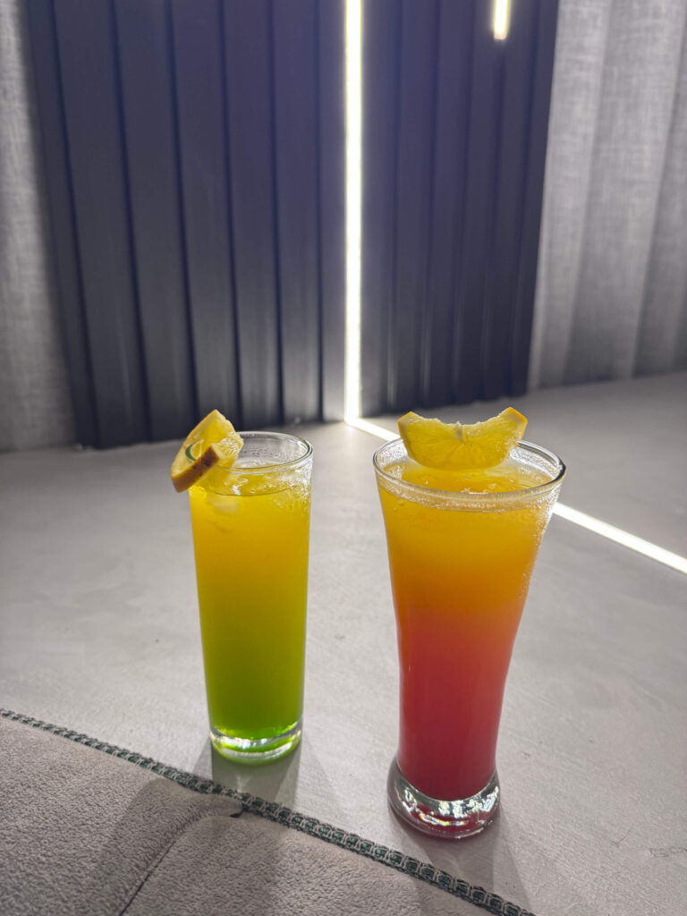 Bright coloured fruity cocktails in the lounge on the MS Royal Adventure Nile cruise ship.