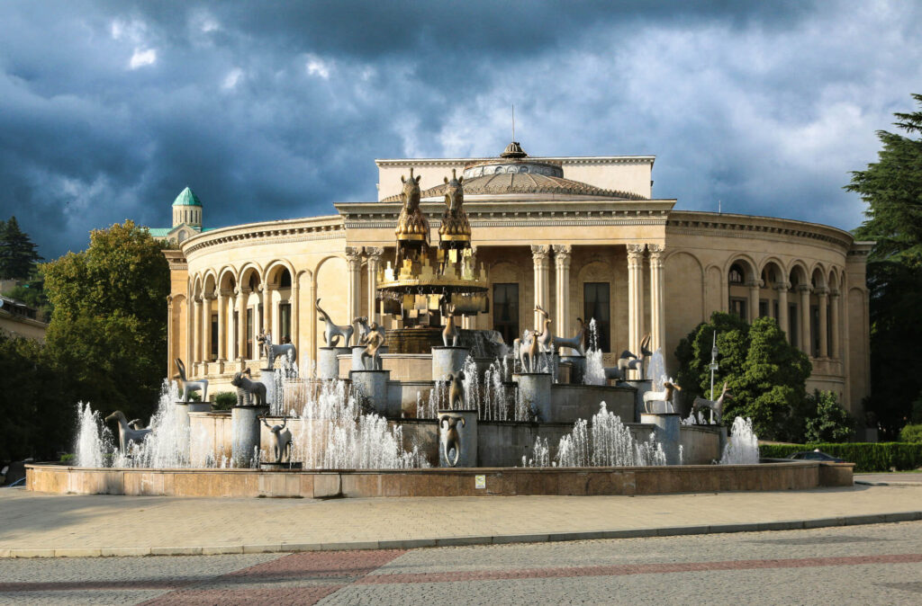 An impressive building with fountains outside it in Kutaisi, Georgia.