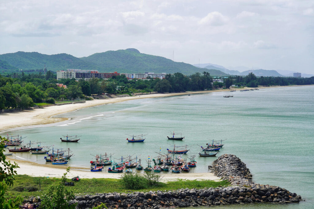 Fishing boats on the sea at Khao Tao beach, Hua Hin, Thailand.