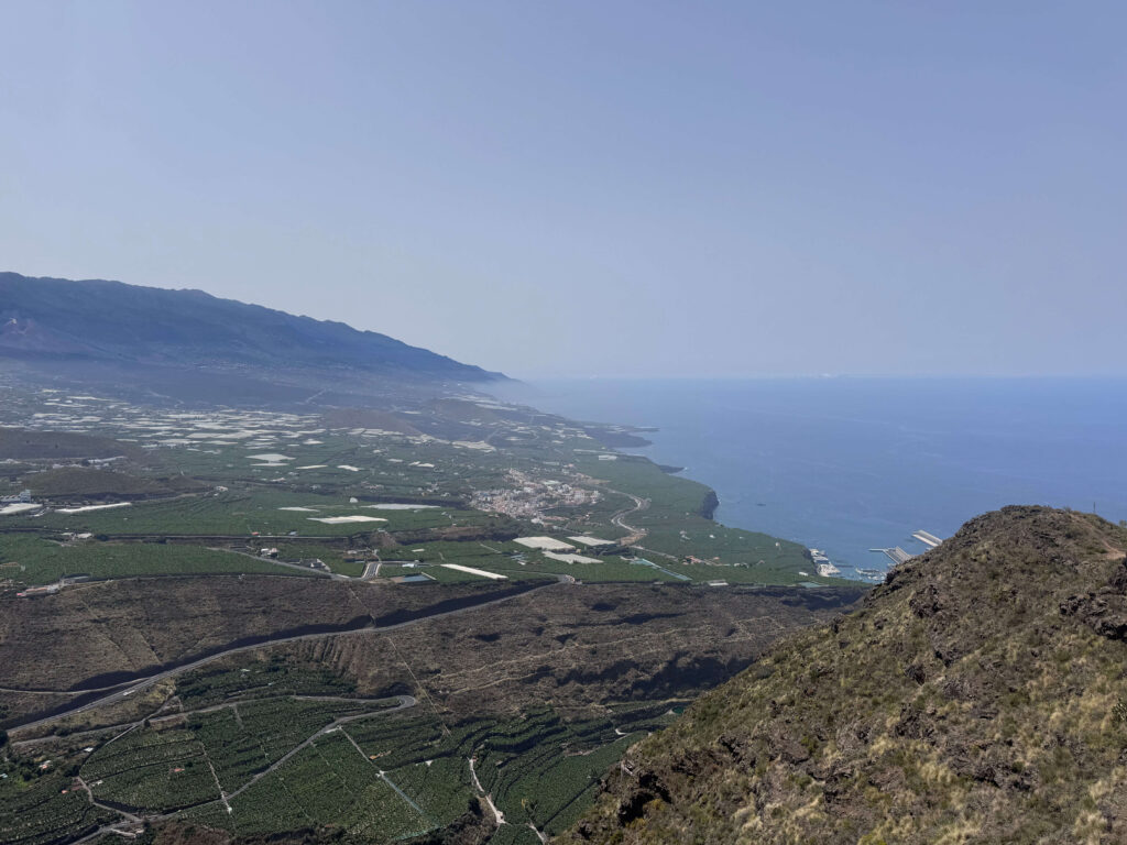 A view out over the misty fields and the ocean in La Palma.